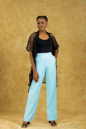 Woman wearing light blue wide-leg pants with black bodysuit and mesh kimono – Breez Set