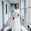 Elegant Long Sleeve Lace Wedding Dress with Train – Bespoke Bridal Gown | Bojamiley Lagos