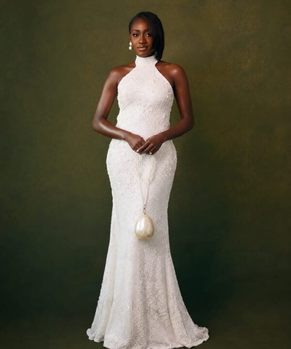 An image of a fitted wedding reception gown