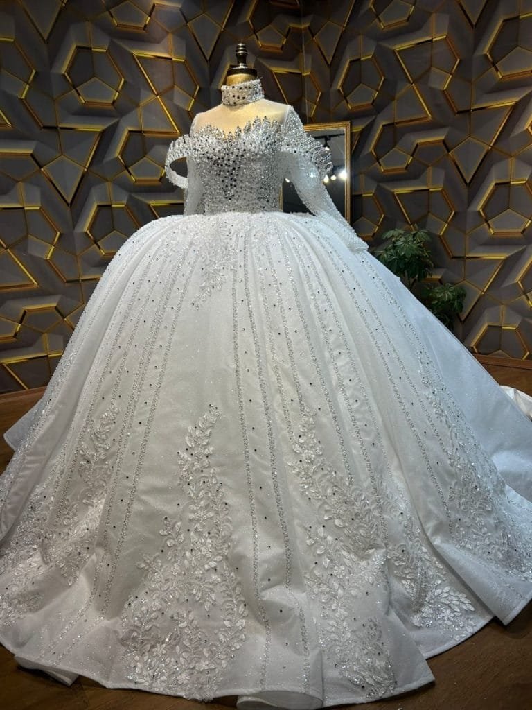 Completed Bojamiley bridal gown on a form, packed and prepared for international dispatch
