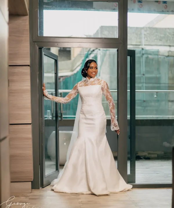 This is an image of a luxury wedding dress with trumpet silhouette